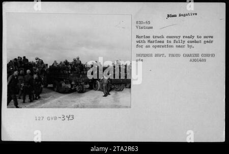 Marine Corps truck convoy prepares to move for an operation near Vietnam. The convoy consists of various vehicles including jeeps, mules, trucks, and dune buggies. Marines are seen in full combat gear, ready for action. This photograph was taken during the Vietnam War. Stock Photo