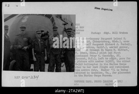 Captured in this photograph is a group of military personnel from the Vietnam War era. The individuals, including Gunnery Sergeant Leland E. Andley, Staff Sergeant Richard J. Purtell, Lieutenant Colonel Du Wayne W. Hoffert, and First Lieutenant Peter Cacciola, are seen posing with an ageing UH-34D helicopter, number 1,3971. The helicopter was retired after her last flight and is being returned to Quantico, Va., for display in the Marine Corps Museum. This image was taken by SSgt Bill Graham in 1968. Stock Photo