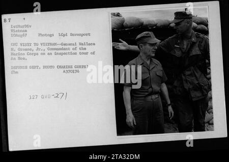 High-ranking military officials and politicians visit Vietnam during the Vietnam War. Pictured are Hubert Humphrey, Gen William Westmoreland, and Sen Harry F Byrd, in the company of General Wallace M. Greene, Jr., Commandant of the Marine Corps. The purpose of the visit was to inspect the military activities of the 87 IstMarDiv in An Hoe. Stock Photo