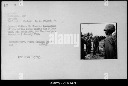 General Wallace M. Greene, Commandant of the Marine Corps, visits F Company, 2nd Battalion, 9th Marines' perimeter on January 7, 1966. The photo was taken by H. C. WOLFORD Jr. during the Vietnam War. Stock Photo