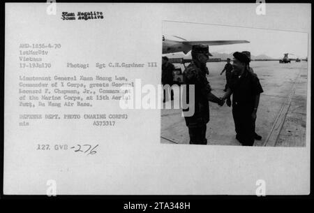 Lieutenant General Xuan Hoang Lam greets General Leonard F. Chapman, Jr., Commandant of the Marine Corps, at 15th Aerial Pots, Da Nang Air Base during the Vietnam War. Stock Photo