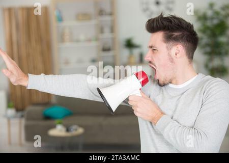 a busy frustrated businessman angry in the office Stock Photo