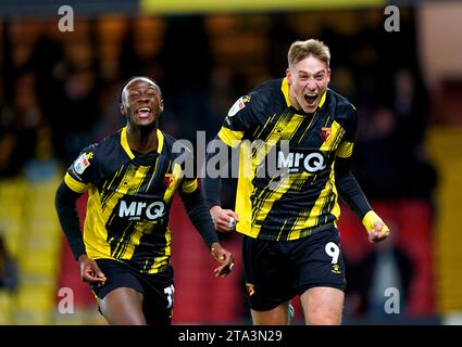 Watford's Mileta Rajovic (right) celebrates scoring their side's second goal of the game during the Sky Bet Championship match at Vicarage Road, Watford. Picture date: Tuesday November 28, 2023. Stock Photo