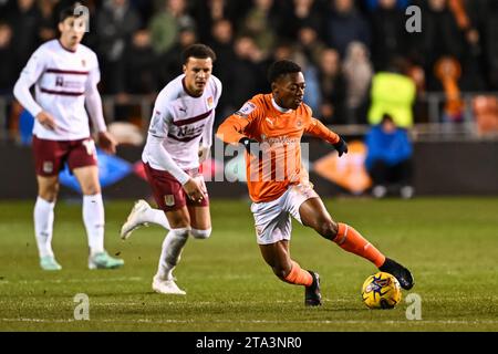 Karamoko Dembélé #11 of Blackpool makes a break with the ball during the Sky Bet League 1 match Blackpool vs Northampton Town at Bloomfield Road, Blackpool, United Kingdom, 28th November 2023  (Photo by Craig Thomas/News Images) in ,  on 11/28/2023. (Photo by Craig Thomas/News Images/Sipa USA) Stock Photo