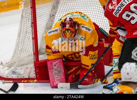 Lausanne, Switzerland. 11th Aug, 2023. Stéphane Charlin (goalie) of SCL Tigers #33 makes a stop during The ten years of club promotion. The match of the 27th day of the 2023-2024 season took place at the Vaudoise Arena in Lausanne between Lausanne HC and SCL Tigers. Lausanne HC won 6-2. (Photo by: Eric Dubost/Sipa USA) Credit: Sipa USA/Alamy Live News Stock Photo