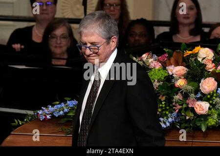 Atlanta, United States. 28th Nov, 2023. James 'Chip' Carter walks past the casket of his mother, former first lady Rosalynn Carter, at Glenn Memorial Church at Emory University on Tuesday, November 28, 2023, in Atlanta, Georgia. Pool Photo by Brynn Anderson/UPI Credit: UPI/Alamy Live News Stock Photo