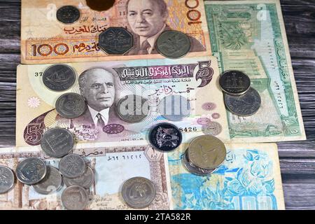 Collection of Old Arabian money banknotes and coins from different countries, Tunisia, Algeria, Morocco, Lebanon, and other Arab countries, vintage re Stock Photo