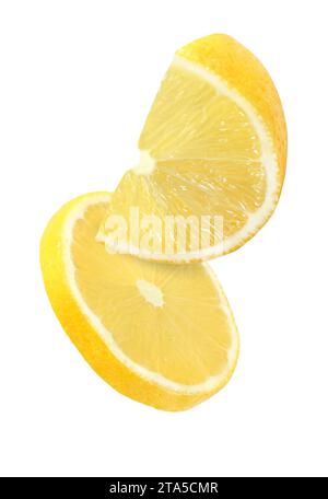 hanging, falling and flying piece of lemon fruits isolated on white background with clipping path Stock Photo
