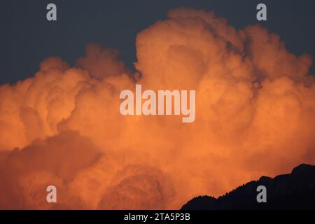 clouds before thunderstorm at sunset in the mountains Stock Photo