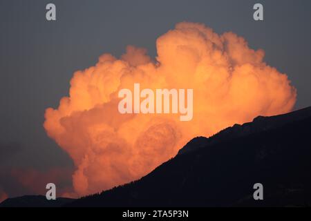 clouds before thunderstorm at sunset in the mountains Stock Photo