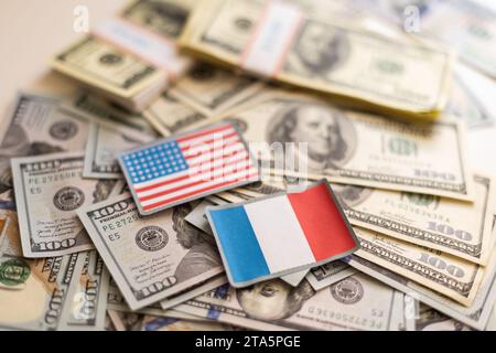 France flag with US dollars as background. Concept for investors, soft focus Stock Photo