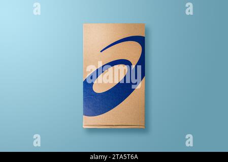 Antalya, Turkey - November 28, 2023: Sport shoe box with Asics logo printed. on blue background Stock Photo