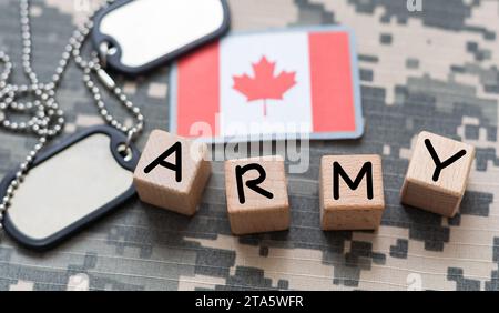 Flag of Canada on military uniform. Canadian soldiers. Army of Canada. Remembrance Day. Canada Day. Stock Photo