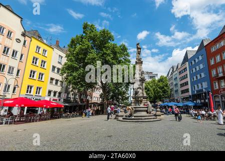 Cologne, Germany - June 11, 2022: Street view of Cologne at day with colorful houses at old market square in the city of Cologne, North Rhine-Westphal Stock Photo