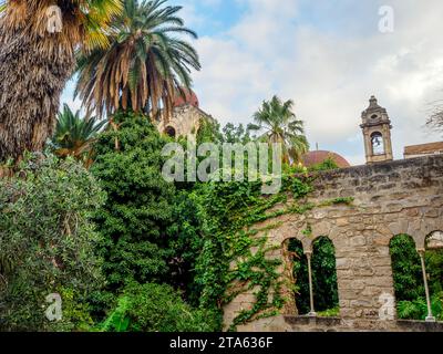 Cloister of San Giovanni degli Eremiti (St John of the Hermits) , an ancient former monastic Arab-Norman and  Romanesque style church - Palermo, Italy Stock Photo