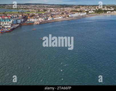 An  aerial view of the town of Exmouth, sitting in the mouth of the River Exe, seen from above Dawlish Warren, Devon, Great Britain. Stock Photo