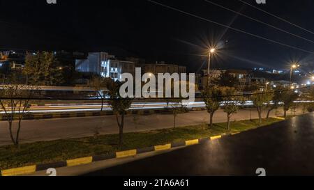 Night view of cars on the street with high shutter speed Stock Photo