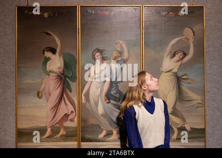 London, UK. 29th Nov, 2023. Preview of The Classics winter auctions, a 9 sale series offering the finest in the classic arts. Highlights include: Old Master Paintings sale, 6 December. George Romney (1734-1802), A three-panelled screen: Classical figures dancing, oil on canvas, laid on card. Estimate: £50,000-70,000. Credit: Malcolm Park/Alamy Live News Stock Photo