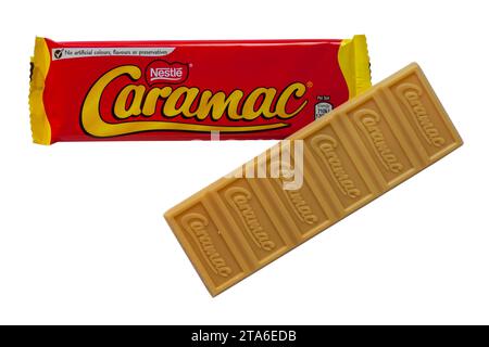 bars of Nestlé Nestle Caramac chocolate one opened to show contents isolated on white background  looking down on from above - The Caramel Flavour bar Stock Photo
