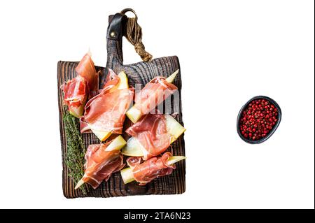 Prosciutto ham with slices of melon and fresh thyme. Isolated, white background Stock Photo