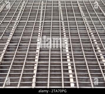 Industrial steel grate grunge vent grille floor Stock Photo