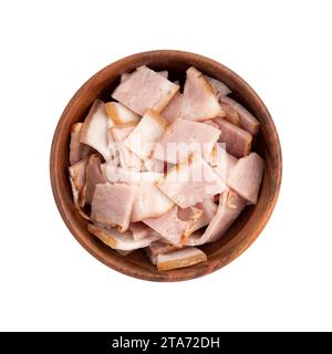 sliced raw smoked bacon in wooden bowl isolated on white background Stock Photo