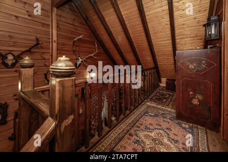 Wooden railing in a hunting cabin Stock Photo