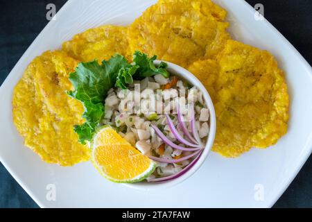 Fish ceviche and corn cakes at a restaurant in Costa Rica Stock Photo