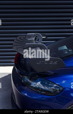 A beautiful brand new Gentian Blue Porsche Cayman GT4 RS waiting to be collected by the new owner and driven to the mountains. Stock Photo