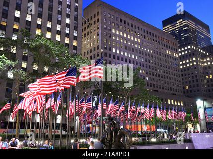 New York, USA - May 25, 2018: American flags near the Rockefeller Centenear in New York City Stock Photo