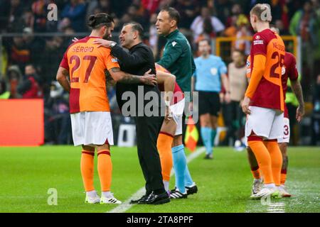 Istanbul, Turkey. 29th Nov, 2023. ISTANBUL, TURKEY - NOVEMBER 29: Sergio Oliveira of Galatasaray interacts with Coach Okan Buruk of Galatasaray AS during the Group A - UEFA Champions League 2023/24 match between Galatasaray A.S. and Manchester United at the Ali Sami Yen Arena on November 29, 2023 in Istanbul, Turkey. ( Credit: BSR Agency/Alamy Live News Stock Photo