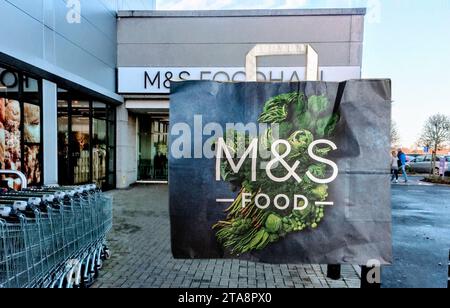 Image of a Marks and Spencer bag showing a map of Ireland, represented by various foodstuffs, superimposed on an image of a Marks and Spencer Store. Stock Photo