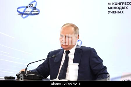 Sochi, Russia. 29th Nov, 2023. Russian President Vladimir Putin listens during a meeting of the Congress of Young Scientists at the Sirius Park of Science and Art, November 29, 2023 in Sochi, Russia. Credit: Mikhail Klimentyev/Kremlin Pool/Alamy Live News Stock Photo