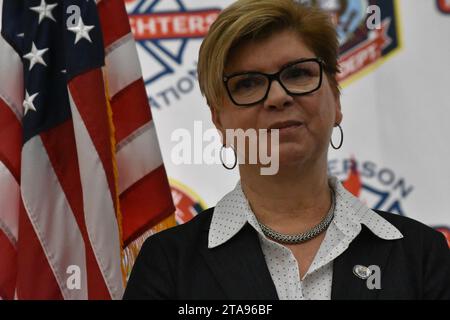 Paterson, United States. 29th Nov, 2023. Senator Nellie Pou seen during the swearing ceremony of Alejandro Alicea as the first Hispanic Fire Chief in Paterson's history at Paterson Fire Department Headquarters in Paterson. Chief Alejandro Alicea, a proud Puerto Rican embodies a deep connection to the city, having been born and raised in Paterson and who has over 20 years of service in the Paterson Fire Department. Credit: SOPA Images Limited/Alamy Live News Stock Photo