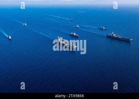 At Sea. 3rd Nov, 2023. Ships from the Gerald R. Ford and Dwight D. Eisenhower Carrier Strike Groups (CSG), U.S. Sixth Fleet command ship USS Mount Whitney (LCC 20), and Italian Navy frigates Carlo Margottini (F 592) and Virginio Fasan (F 591) sail in formation in the Mediterranean Sea, Nov. 3, 2023. The two carrier strike groups are operating in the area at the direction of the Secretary of Defense to bolster deterrence in the region. (Credit Image: © Janae Chambers/U.S. Navy/ZUMA Press Wire) EDITORIAL USAGE ONLY! Not for Commercial USAGE! Stock Photo