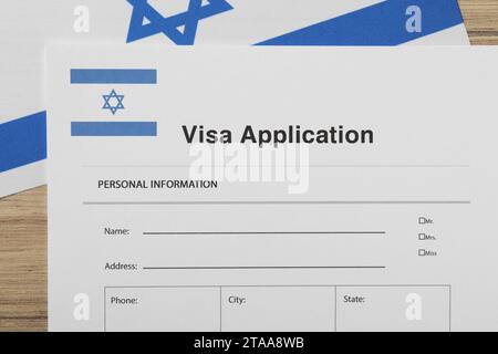Top view of visa application form with unrecognizable worker putting ...
