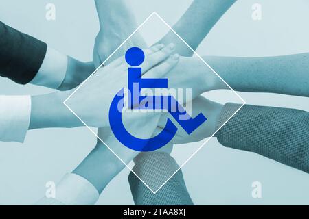 Inclusive workplace culture. International symbol of access. People holding hands together, closeup Stock Photo