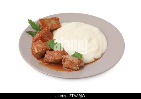 Delicious goulash with mashed potato isolated on white Stock Photo