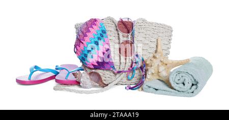 Stylish bag, starfish and other beach accessories isolated on white Stock Photo