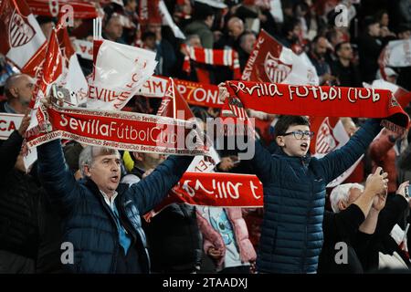 Seville, Spain. 29th Nov, 2023. Sevilla's supporters cheer for the team during the UEFA Champions League Group B match between Sevilla FC and PSV Eindhoven in Seville, Spain, on Nov. 29, 2023. Credit: Zhang Yuheng/Xinhua/Alamy Live News Stock Photo