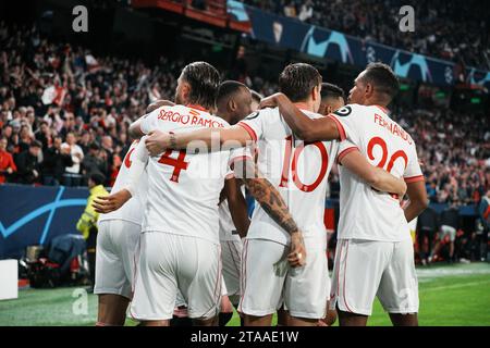 Seville, Spain. 29th Nov, 2023. Sevilla's players celebrate a goal during the UEFA Champions League Group B match between Sevilla FC and PSV Eindhoven in Seville, Spain, on Nov. 29, 2023. Credit: Zhang Yuheng/Xinhua/Alamy Live News Stock Photo