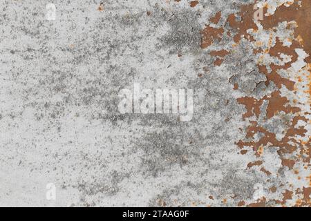 Old white peeling paint with rusty brown metal surface texture background worn. Stock Photo