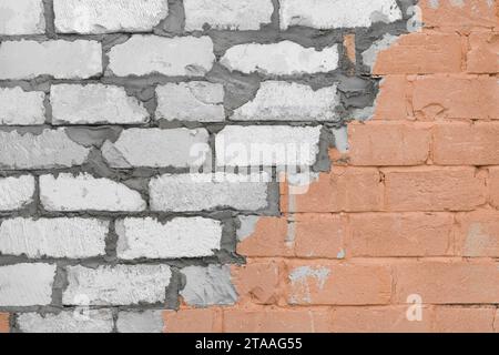 Old brickwork white silicate blocks and cement with colored paint texture background. Stock Photo