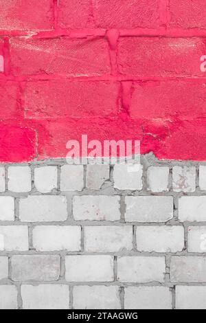 Old White Silicate Blocks Brick Vertical Wall Two Colors Red Pink Paint Texture Background. Stock Photo