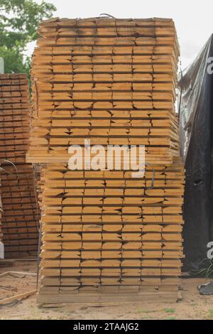 Wood stack storage timber wooden materials lumber pile industry stock. Stock Photo
