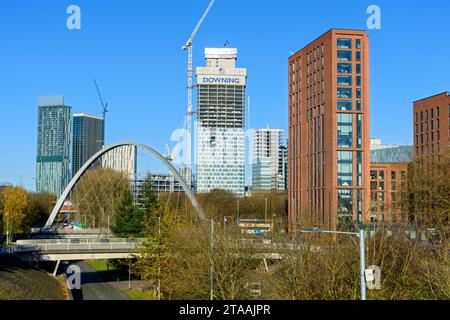 The Beetham Tower, Axis Tower, Square Gardens (under construction) and Archway apartment blocks over the Hulme Arch bridge, Manchester, England, UK Stock Photo