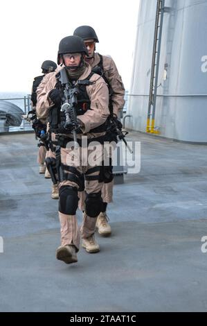 Visit, board, search and seizure team 140118-N-WK391-034. Stock Photo