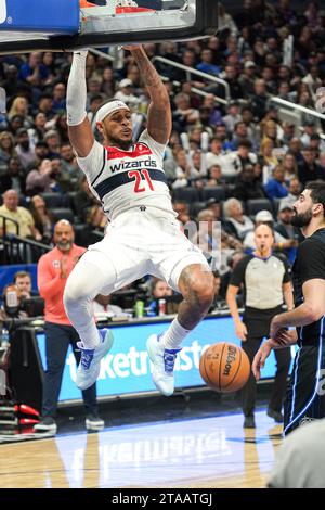 Washington Wizards center Daniel Gafford, center left, and New York ...