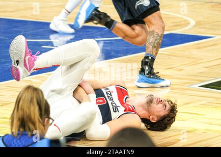 Orlando, Florida, USA, November 29, 2023, Washington Wizards forward Deni Avdija #8 on the floor in pain during the second half at the Amway Center. (Photo Credit: Marty Jean-Louis/Alamy Live News Stock Photo