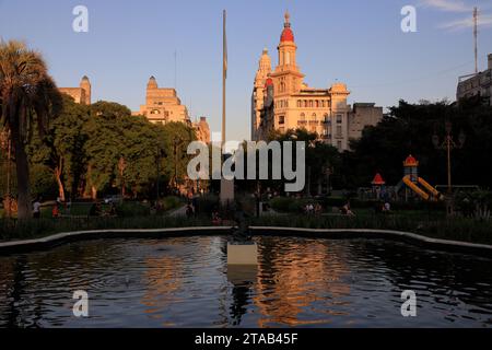 Plaza Mariano Moreno with Edificio De La Inmobiliaria building and Palacio Salvo on Avenida de Mayo in the background.Buenos Aires.Argentina Stock Photo